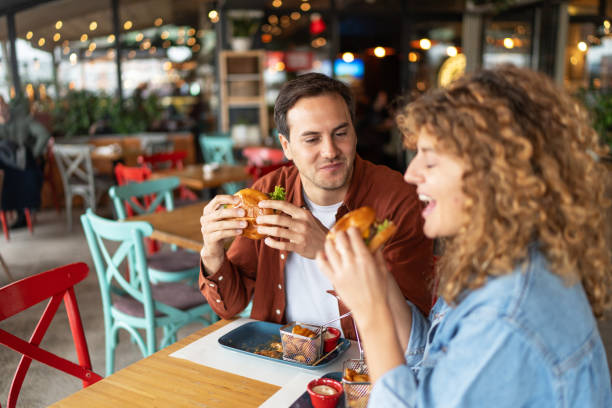 istock Happy couple in the restaurant 2196909483
