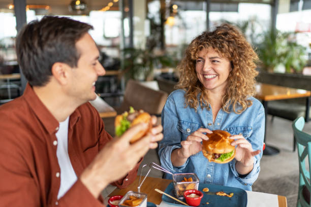istock Happy couple in the restaurant 2196909506