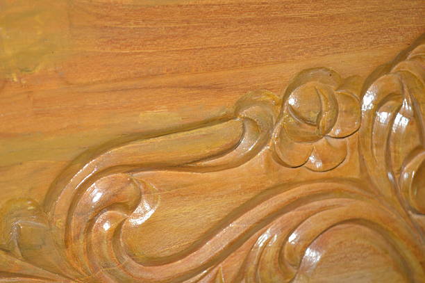Wood carvings on the wooden board. Old Wood carving on the wooden bed in wood carving photo