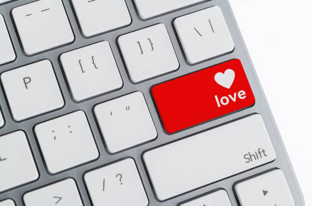 istock Computer keyboard with heart icon and word love 2196931307
