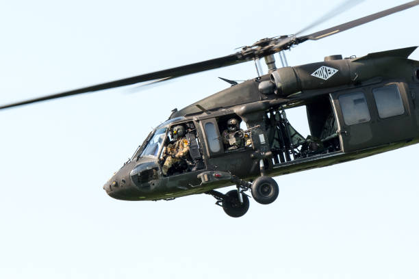 A US Air Force Sikorsky UH-60 Black Hawk from the 101st Airborne Division leaving the scene of an air attack demonstration commemorating Operation Market Garden in The Netherlands