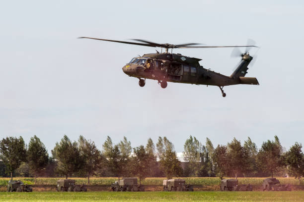A US Air Force Sikorsky UH-60 Black Hawk from the 101st Airborne Division leaving the scene of an air attack demonstration commemorating Operation Market Garden in The Netherlands