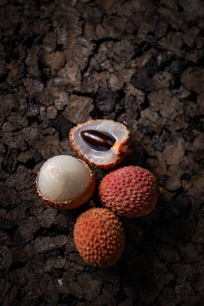 istock Fresh lychees showing white flesh 2196936173