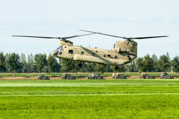 A US Air Force Boeing CH-47 Chinook from the 101st Airborne Division leaving the scene of an air attack demonstration commemorating Operation Market Garden in The Netherlands