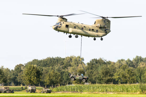 A US Air Force Sikorsky UH-60 Black Hawk from the 101st Airborne Division dropping soldiers for an air attack demonstration commemorating Operation Market Garden in The Netherlands
