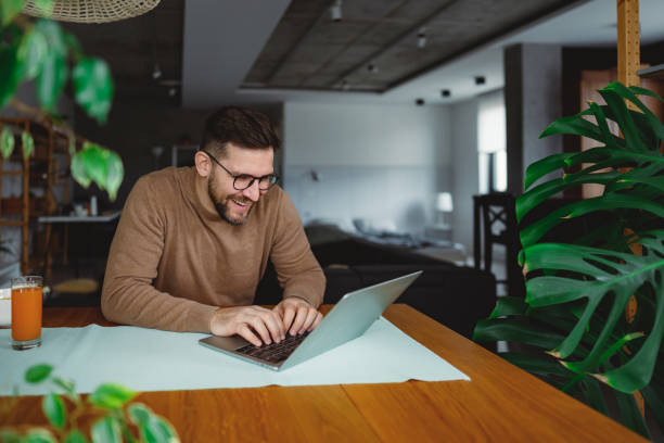 istock Young Man Working from Home, Enjoying a Relaxing and Productive Day 2196937345