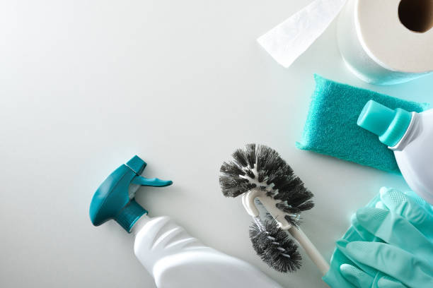istock Cleaning supplies for the bathroom on white table top view 2196939190