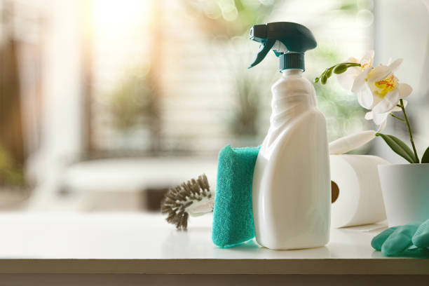 istock Bathroom cleaning products on white cabinet in a bathroom 2196939196