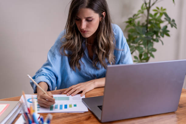 istock Woman working with color palettes on modern desk 2196951535