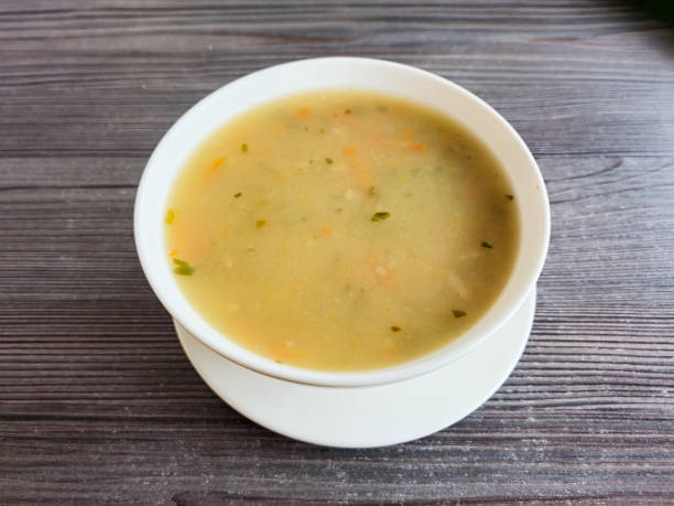 istock White bowl with Krupnik Polish soup. 2196958632