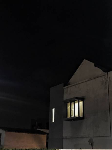 istock a house building at night 2196961967