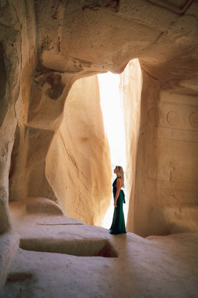 istock Woman Exploring an Ancient Cave Dwelling in Cappadocia, Turkey 2196965177