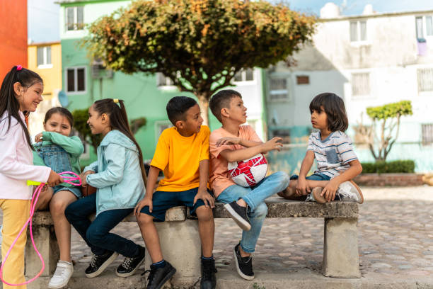 Child friends talking outdoors