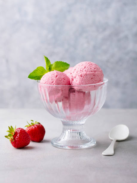 istock Strawberry Ice Cream in a glass bowl on grey background. Copy space. 2196969325