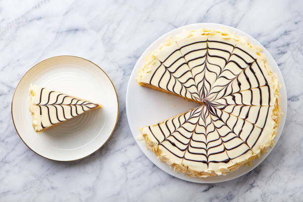 istock Traditional Hungarian Esterhazy cake on a white plate. Marble background. Close up. Top view. 2196969585