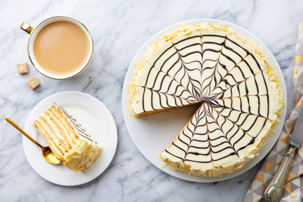istock Esterhazy cake, torte with cup of coffee. Marble background. Close up. Top view. 2196969717