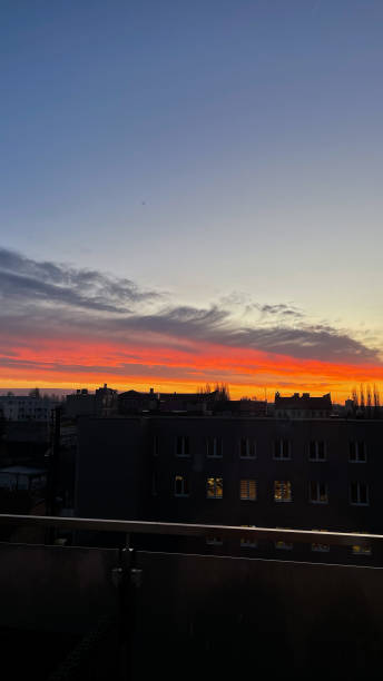 istock Cityscape at Sunrise with Vibrant Sky 2196971588