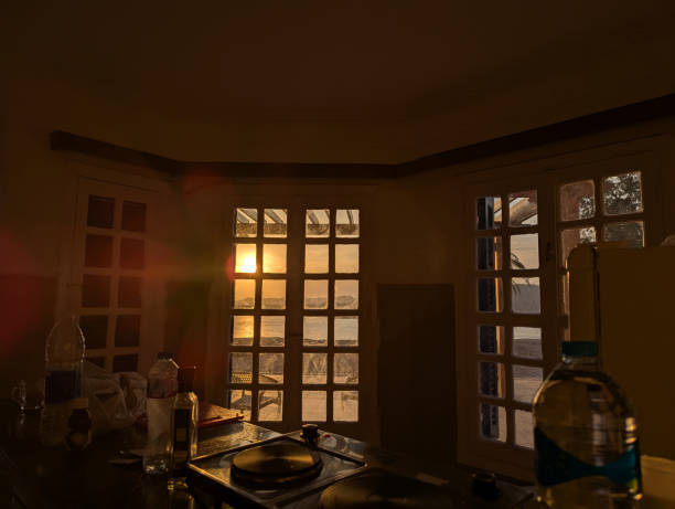 istock The warm sunset glow beautifully illuminates the kitchen windows, creating a serene ambiance 2196972709