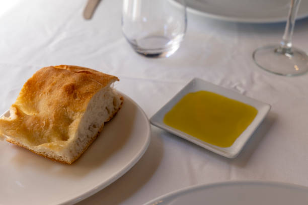 istock Homemade bread and olive oil for appetizer in restaurant Spain 2196974628