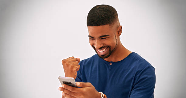 istock Young African American person plays online game 2196975008