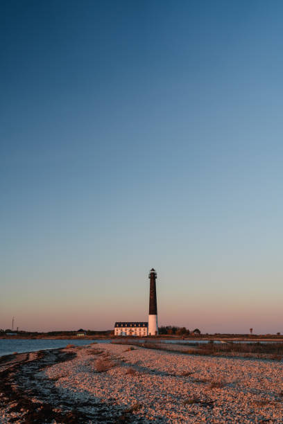 Lighthouse at sunset, Saare County, Estonia