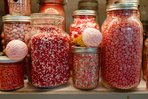 istock Jars filled with various pink candies and sprinkles 2196983068