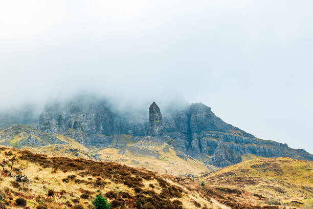 Old Man of Storr Surrounded By Fog in Portree, Scotland, United Kingdom