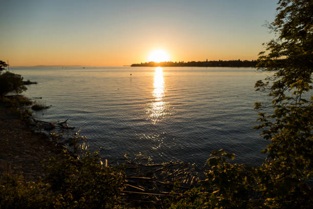 Sunset at lake Bodensee, Lindau Harbour, in Bavaria, Germany in summertime