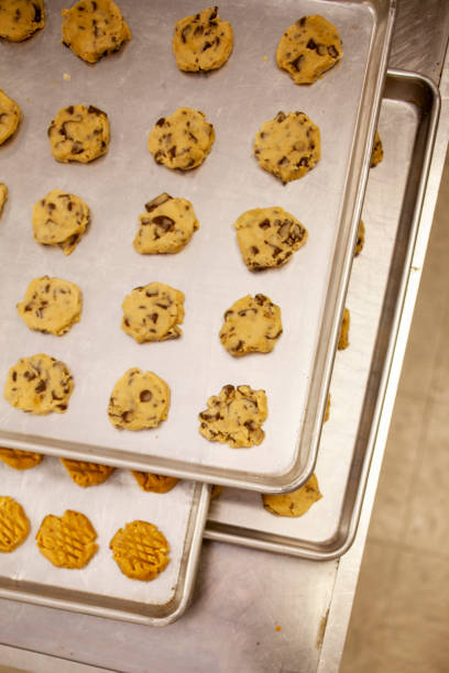 Trays of raw chocolate chip and peanut butter cookie \\ in Phoenix, Arizona, United States