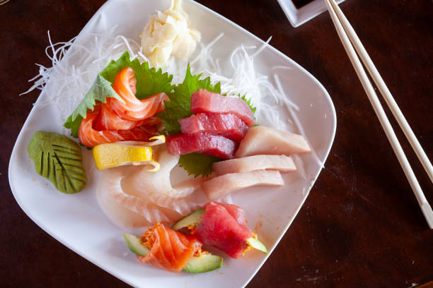 istock Overhead view of sashimi raw fish entree 2196985624