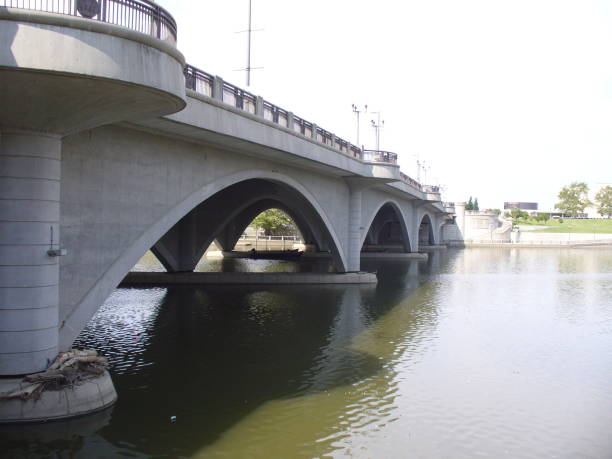 istock Elegant Urban Bridge Spanning Over Tranquil Waters 2196985669