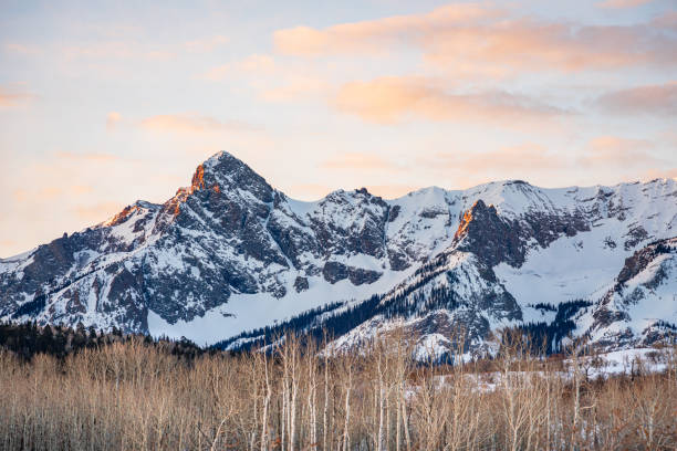 istock winter mountains and aspen grove at sunrise 2196986167