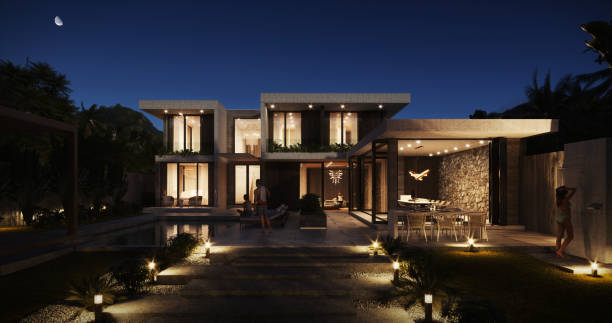 Modern Luxury Villa at Dusk with Illuminated Outdoor Spaces and Pool