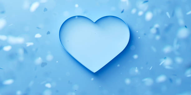 Blue opened heart-shaped box on a background with blurred falling hearts. Valentine's day romantic concept. 3d render illustration
