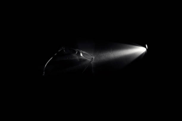 spectacles and beam of light,searching,finding,idea concept
