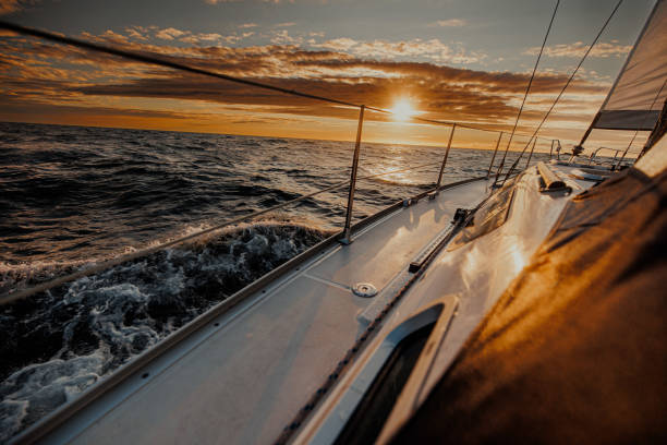 istock sailing yacht sailing at sunset 2196997961