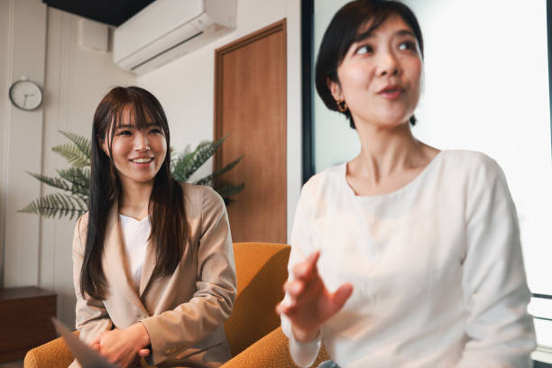 istock Female Business Leaders Work Together Use AI In A Modern Office 2197000472