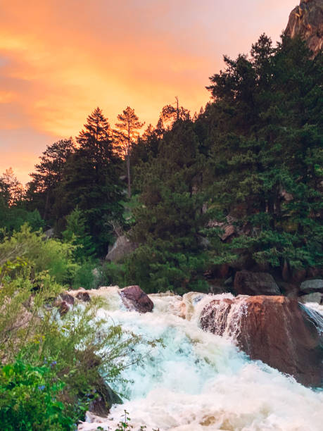 istock Gorgeous Sunset over Flowing Creek 2197001367