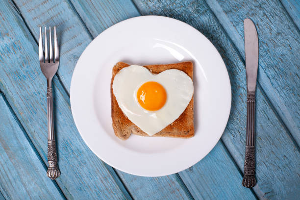 istock Breakfast on Valentine's Day on rustic wooden table. 2197002507