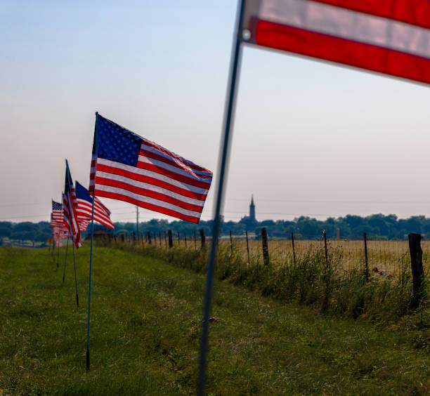 istock Multiple American flags line highway near Shiner, showcasing small-town pride 2197003069