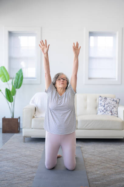 istock Senior at Home Yoga 2197003504
