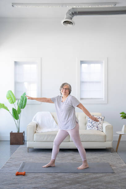 istock Senior at Home Yoga 2197003507