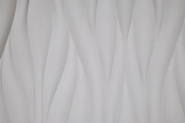 istock Textured wall feature with soft waves in a subtle neutral color palette creating an elegant ambiance 2197003838