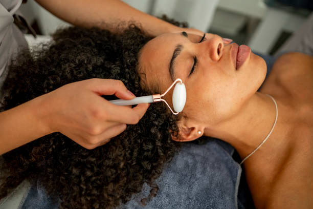 istock Relaxing Jade Roller Facial Massage 2197004482