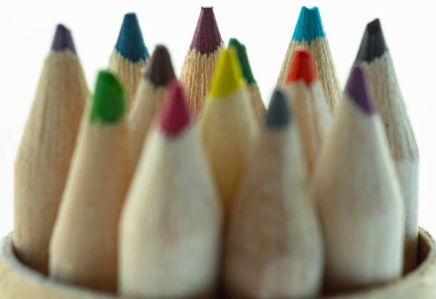 Sharpener next to a red colored pencil for drawing