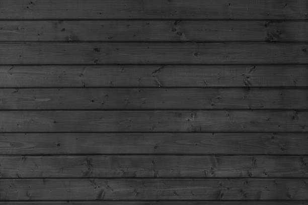 istock Wooden vertical black painted plank texture, timber background, wall panels suface 2197005028