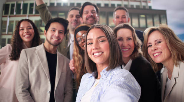 istock Multicultural Business Team Captures Happy Moments 2197012434