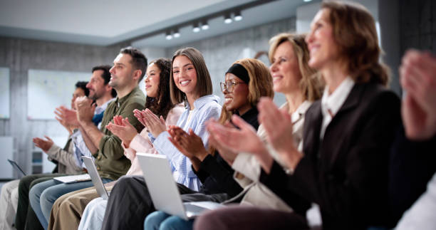 istock Diverse Team of Business Professionals Applauding 2197012463