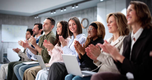 istock Diverse Team of Businesspeople Applauding During Corporate Training 2197012467