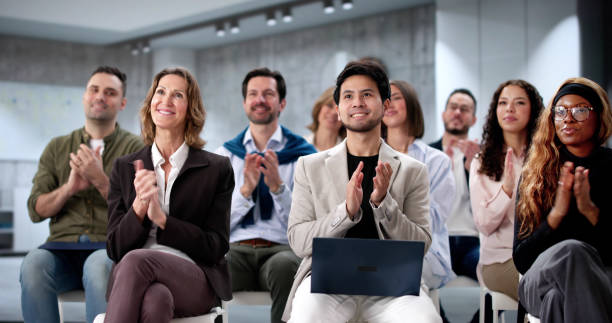 istock Diverse group of business professionals actively participating 2197012478
